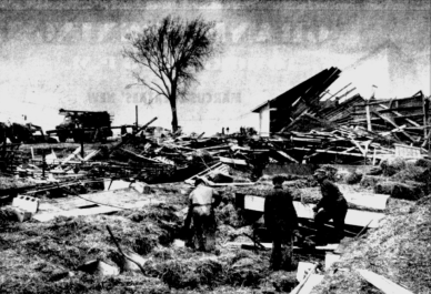 The demolished farm of Edwin Shroeder. A number of cows were killed and buried beneath the hay when the barn was destroyed.