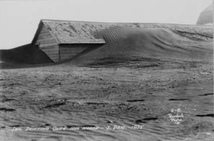 After the "black blizzards" subsided, wind-whipped drifts of topsoil often reached to the roofs of homes.