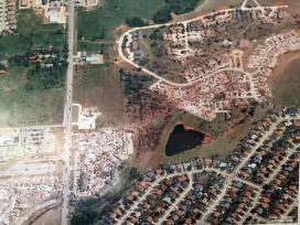 Both Randy Thurman's home (directly above the pond) and the Emerald Springs Apartments (just right of Western Ave) are visible in this aerial photo.
